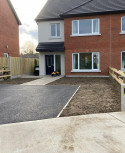 A social housing development in Ballymakenny Road, Drogheda, Co Louth consisting of 50 houses of 3 and 4 bed dwellings along with large green areas planted with native trees and plants. red brick semi