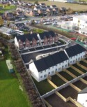 A social housing development in Ballymakenny Road, Drogheda, Co Louth consisting of 50 houses of 3 and 4 bed dwellings along with large green areas planted with native trees and plants. social development